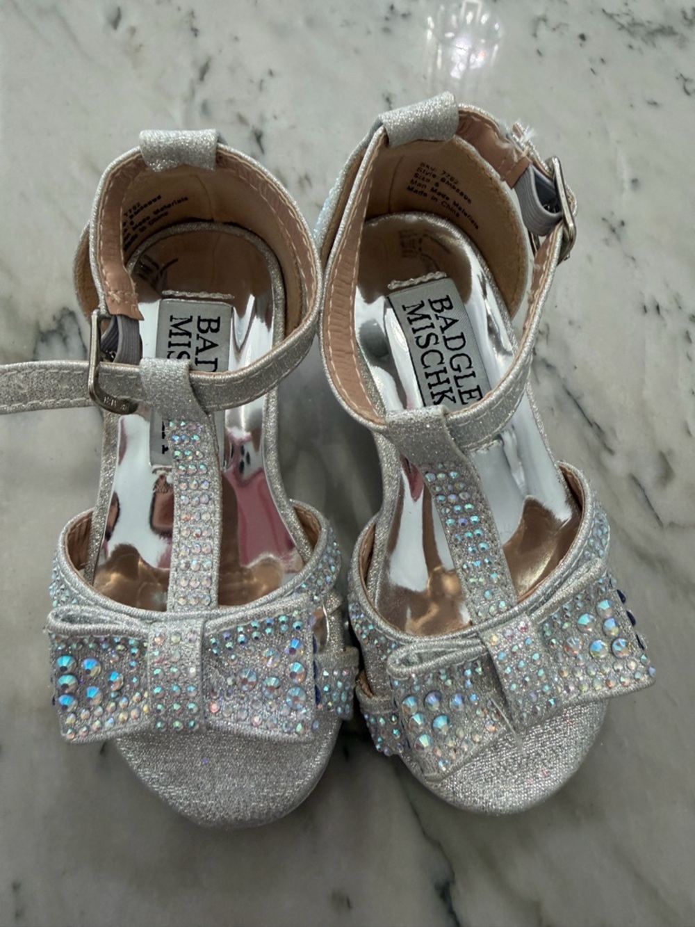 Badgley Mischka Silver Glitter T-Strap Sandals with Crystal Bow Accent